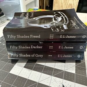 Set of Fifty Shades of grey books. In good condition.